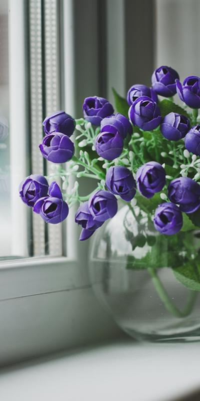 Flowers in a vase, in muted colours